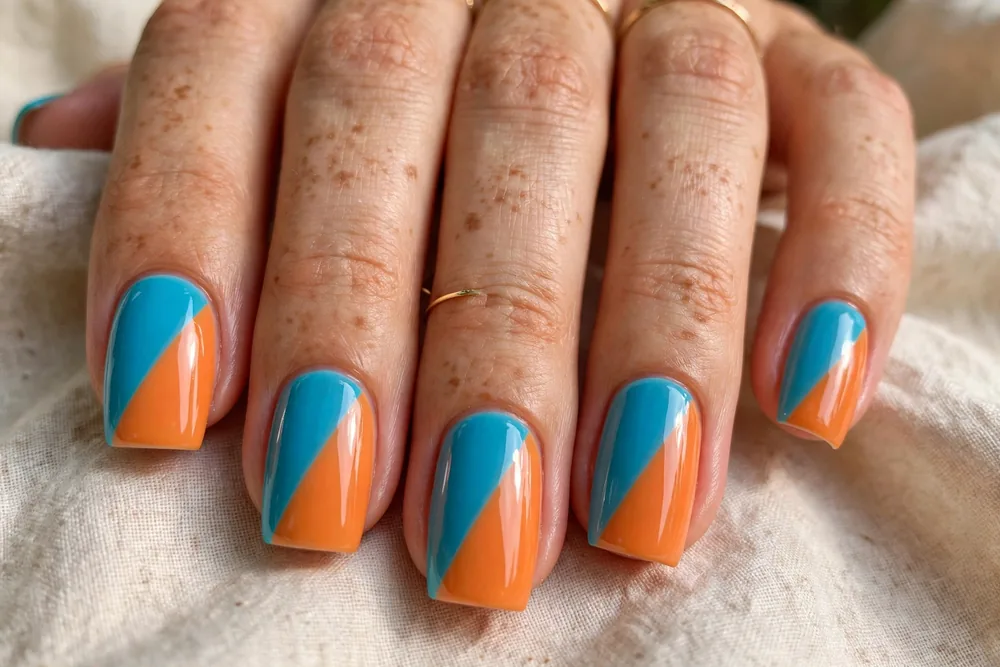 Blue and orange color block nail art
