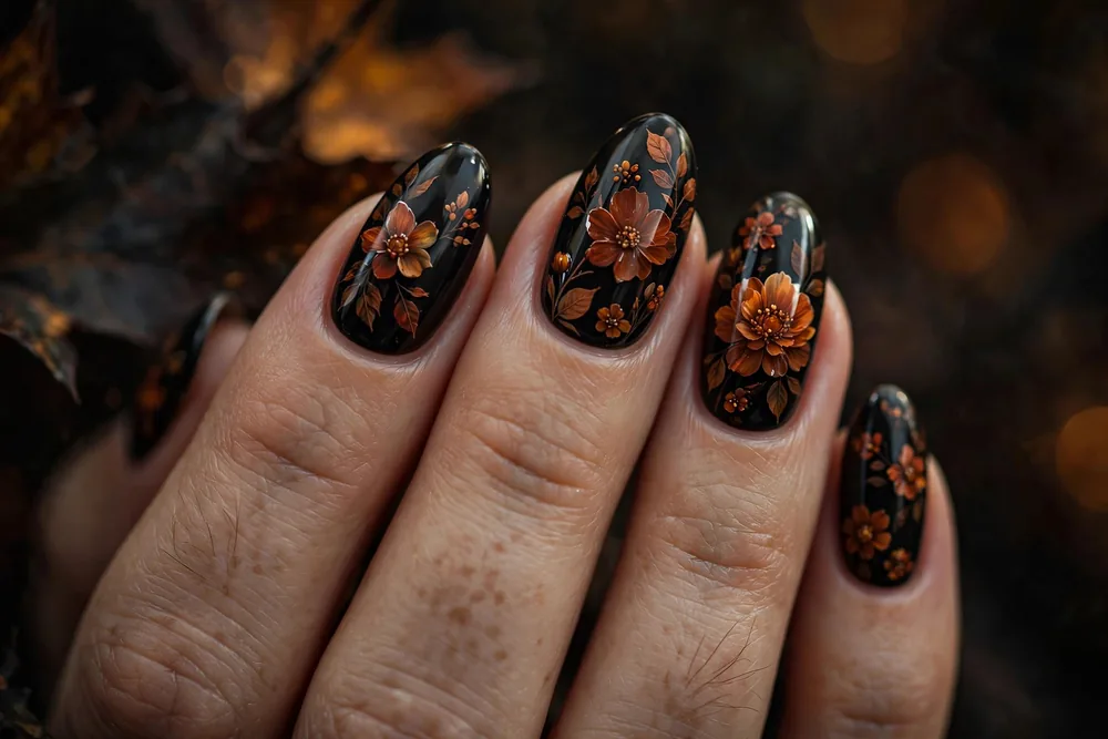 Orange floral fall nails with hand-painted flowers
