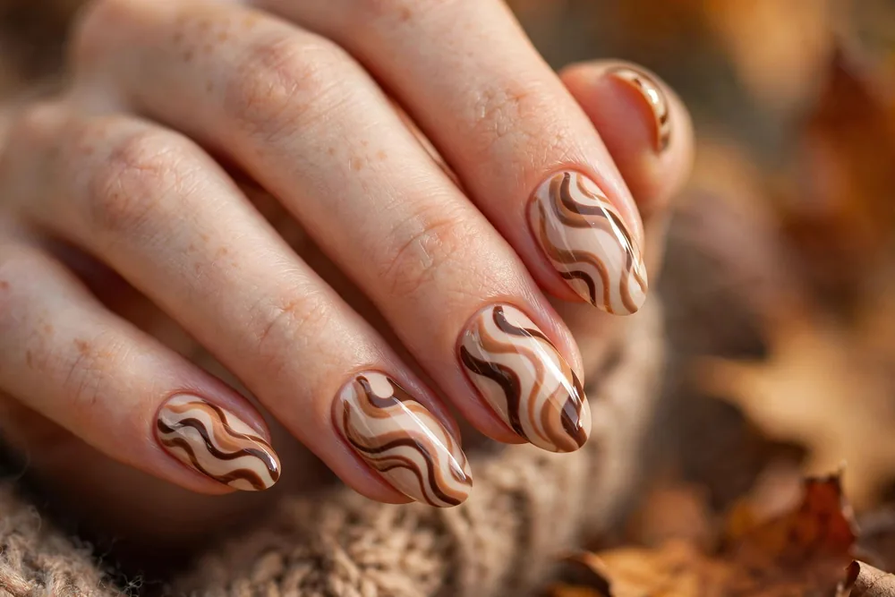Brown swirl fall nails with wavy lines